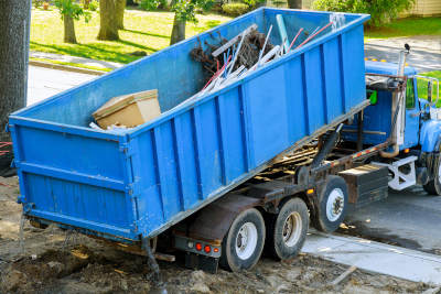 a Dump Truck half full of junk in Hiawatha, KS and Surrounding Areas